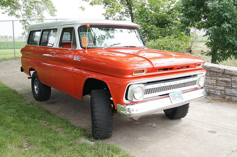 red orange chevy suburban