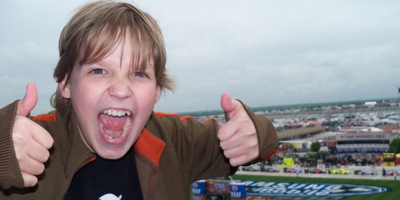 Happy Boy with Thumbs Up