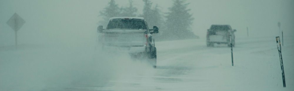 Trucks Driving in the Snow