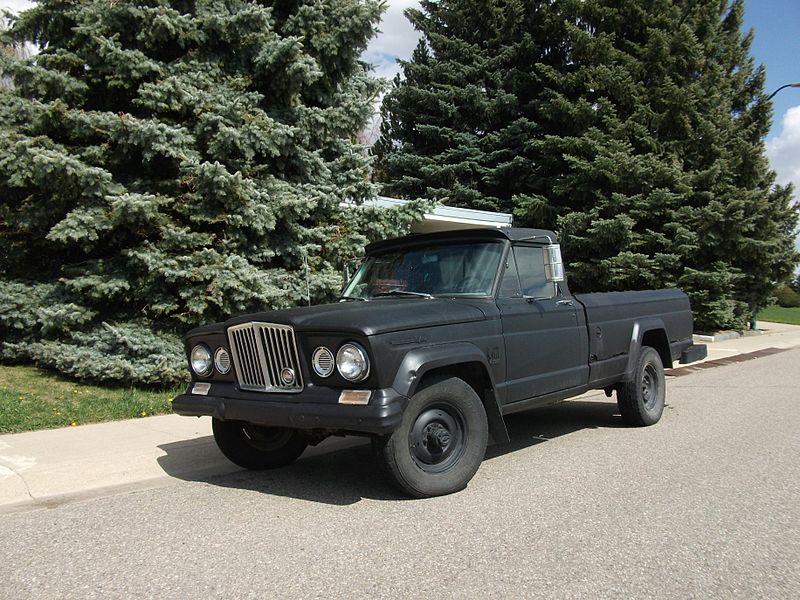 matte black jeep gladiator on the road