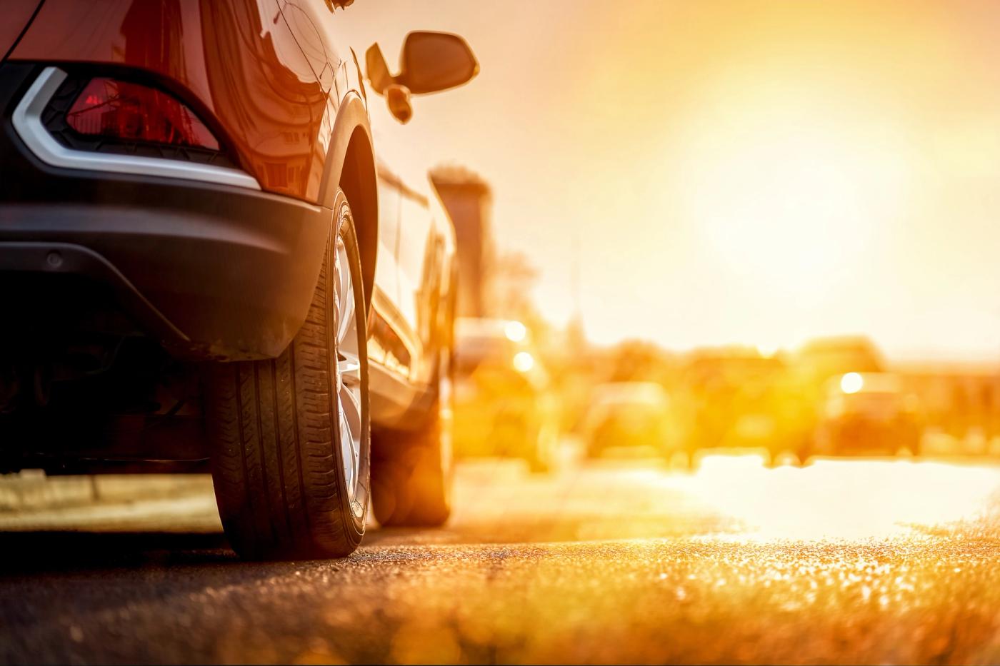 sunset-city-summer-on-highway-cars