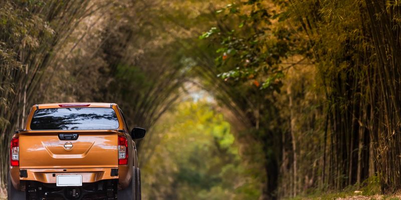 pickup-truck-on-dirt-road-two
