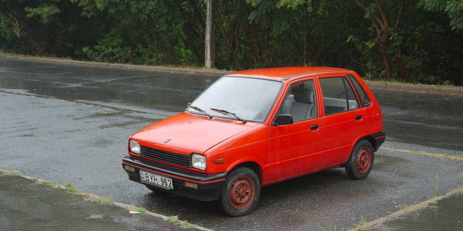 budapest-hungary-may-old-maruti-parked-in-the-street-in-rainy-weather-popular