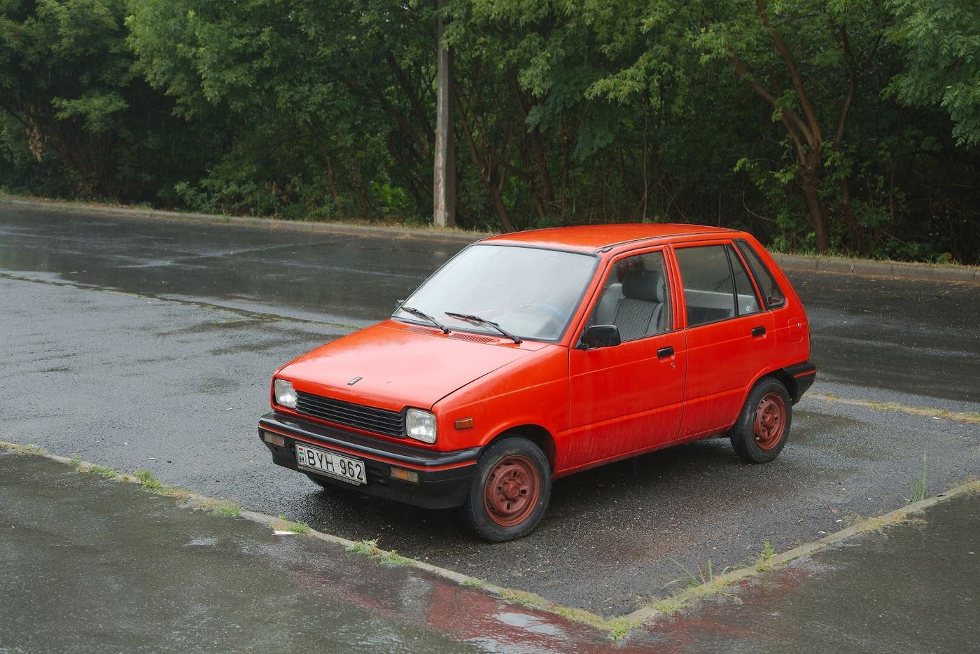 budapest-hungary-may-old-maruti-parked-in-the-street-in-rainy-weather-popular