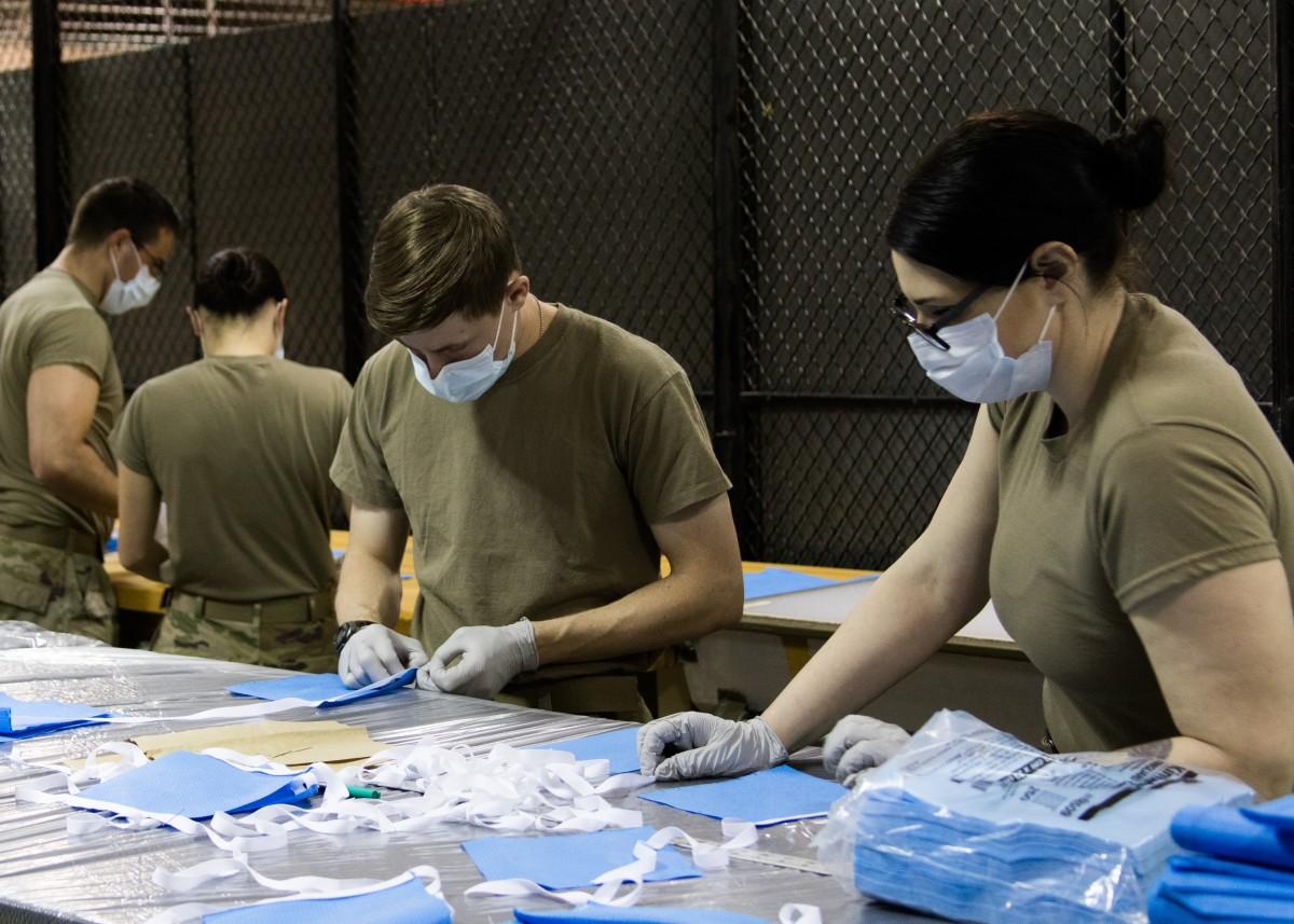military personel making a DIY facemask