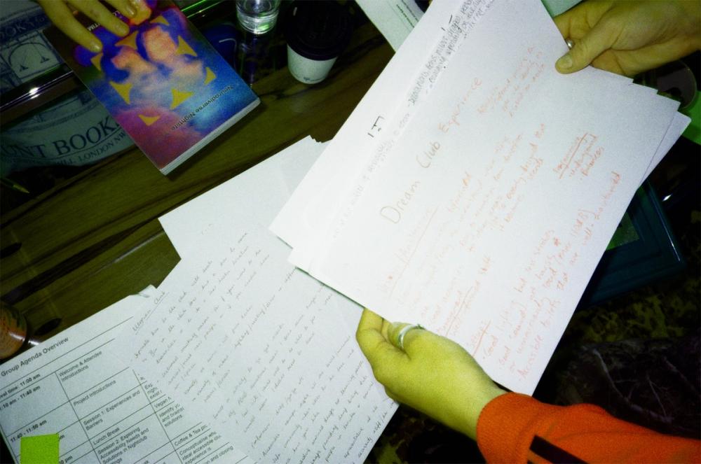Image shows someone going through their notes from the accessibility audit.