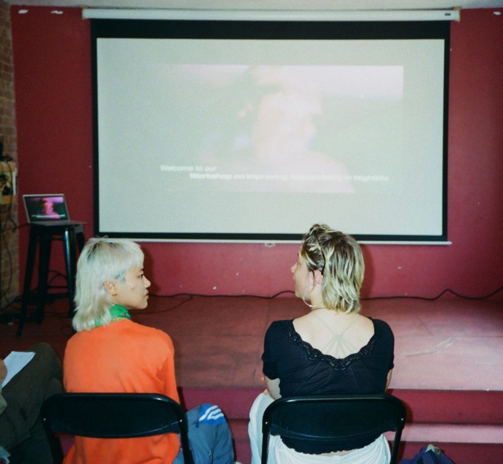 Two people taking place in a workshop.