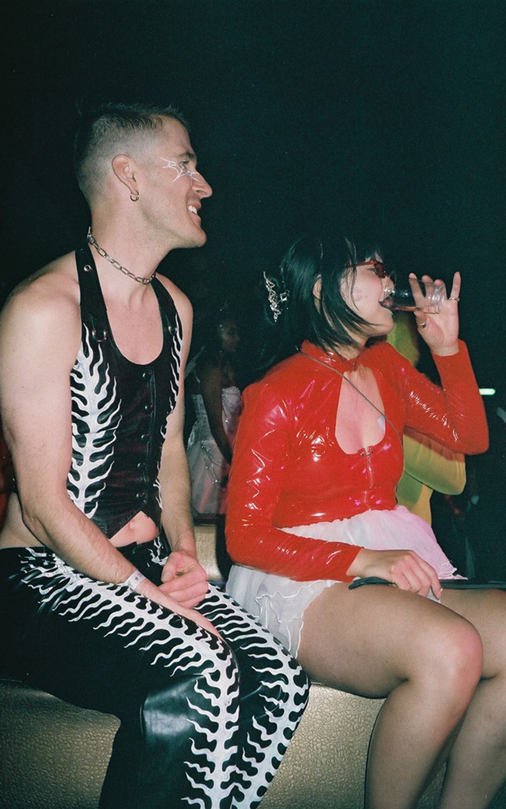 Image of two people at a club