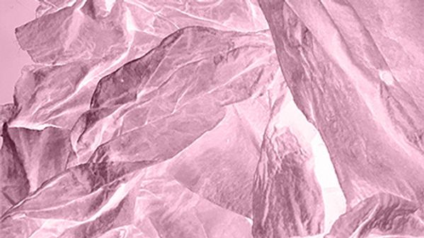 person standing in front of optical illusion wall