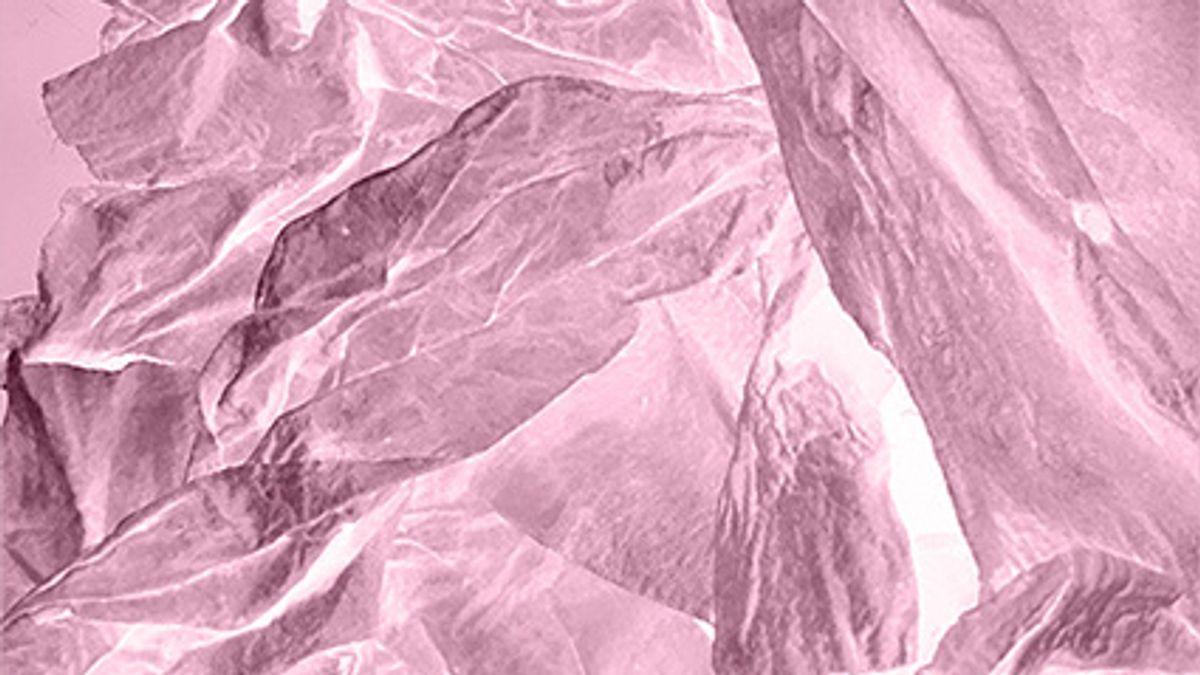 person standing in front of optical illusion wall