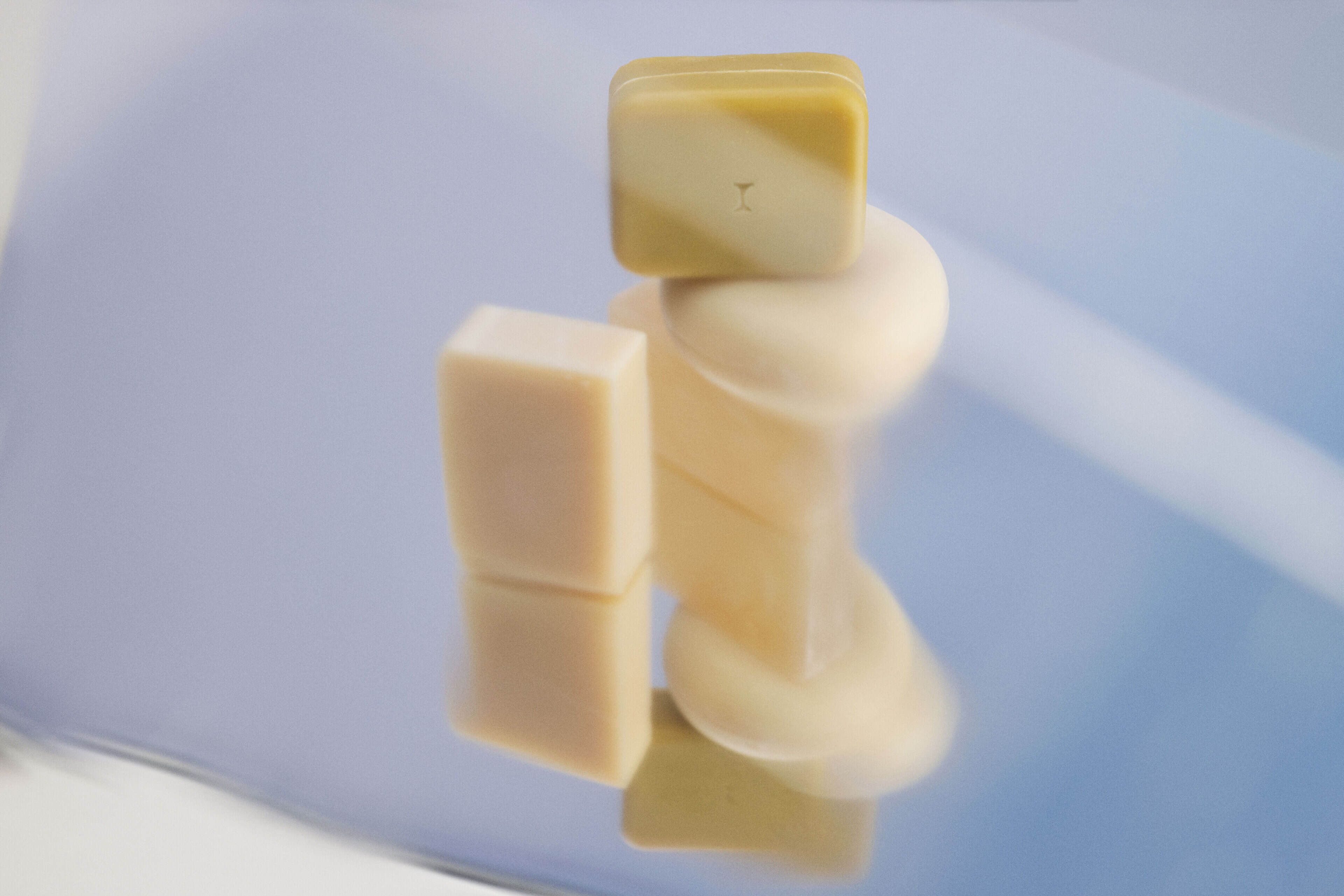 A pile of different shaped soap bars