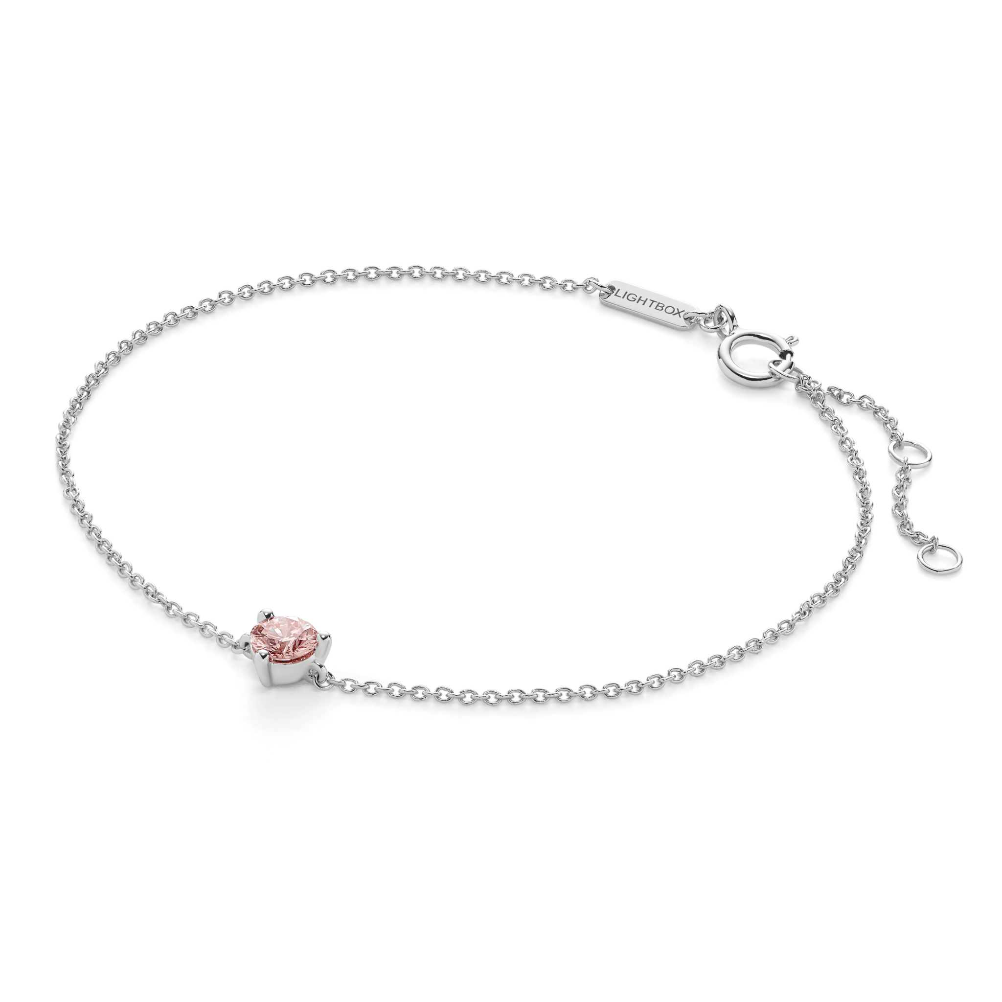 Side view of white gold, lab-grown pink 0.25 carat round brilliant mini bracelet
