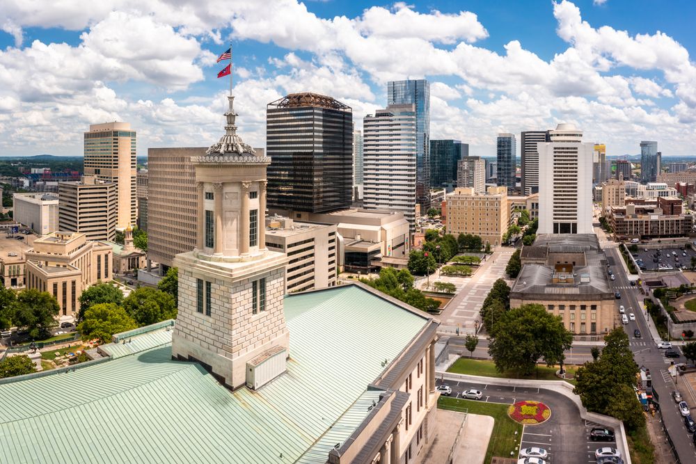Downtown Nashville skyline with the Tennessee State Capitol in foreground.