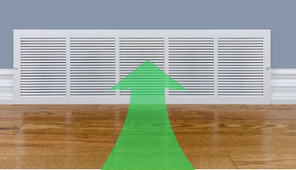 Vue d’une bouche d’entrée avec une flèche verte indiquant l’air aspiré.