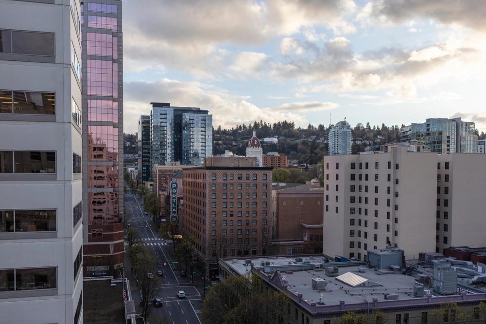States Where Residents Are Spending the Most on Groceries - Infographics of Portland’s downtown from above, representing Oregon’s ranking in states with high grocery expenditures