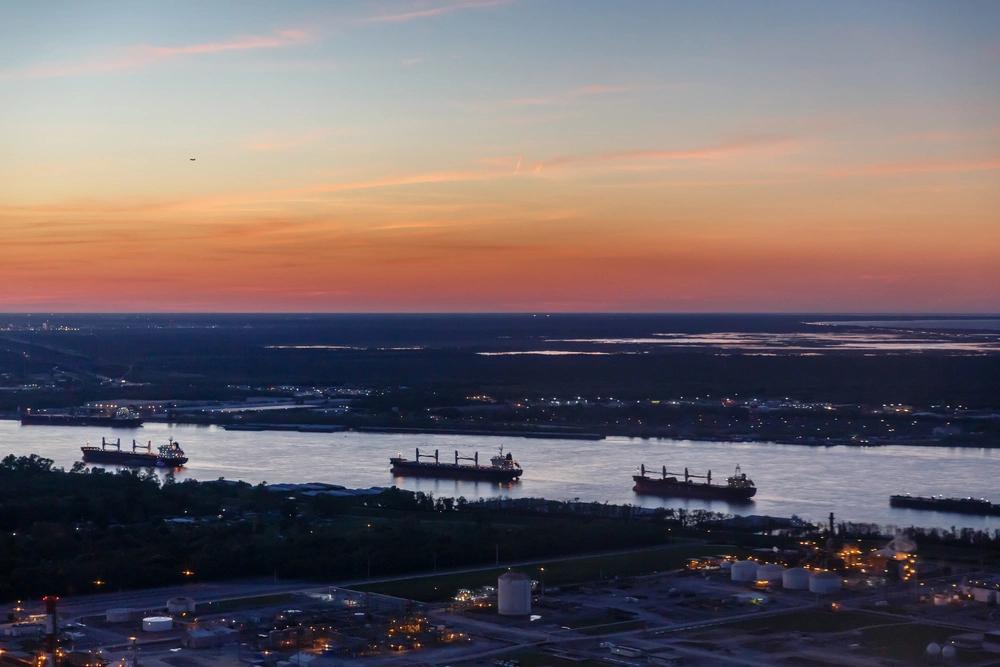 States Where Residents Are Spending the Most on Groceries - Infographics of Cargo ships on the Mississippi River near Louisiana, a state where residents face high grocery prices despite strong food imports.