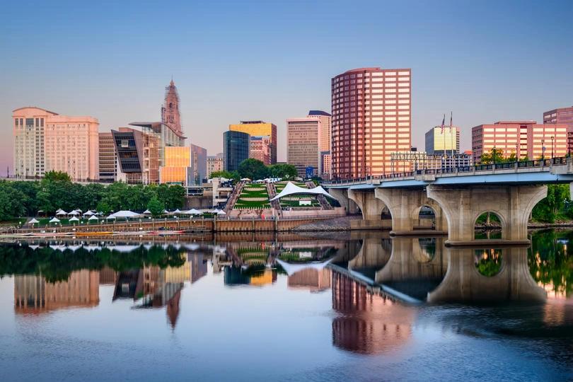 Cityscape of Hartford, Connecticut, where residents in nearby metros report high median monthly utility costs.
