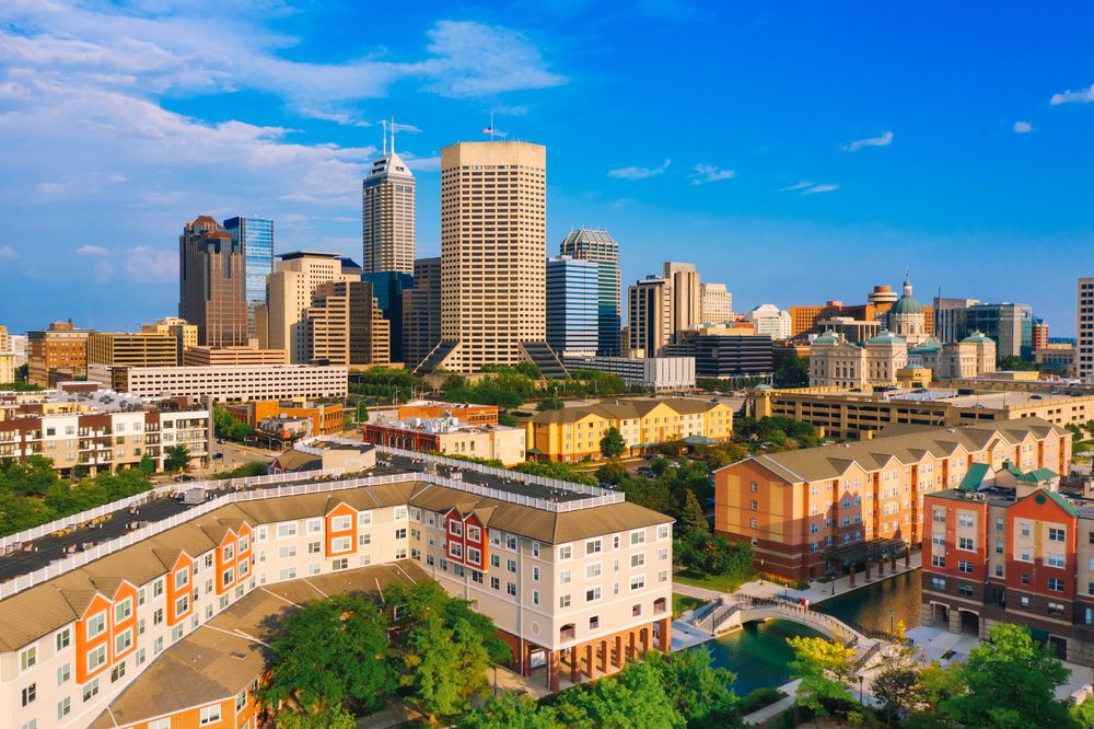 Indianapolis city skyline featuring the downtown canal and colorful apartment complexes