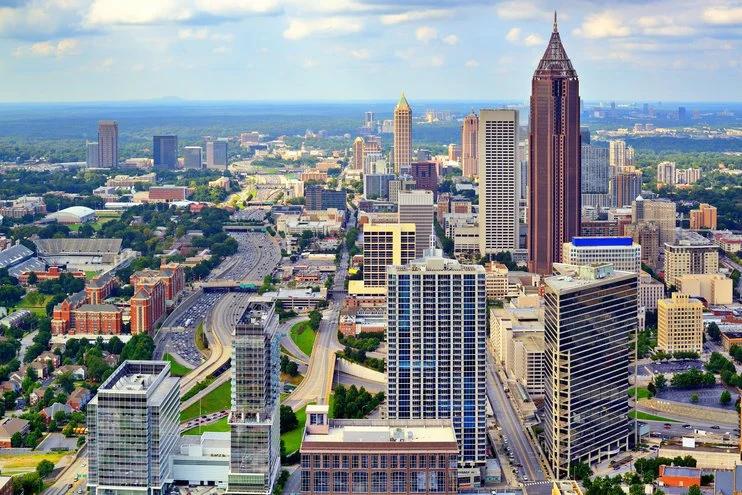 View of Atlanta skyline representing Georgia’s housing challenges amid rising eviction and foreclosure threats.