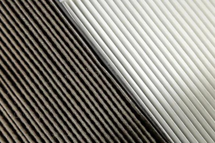 Image of a side-by-side comparison of dirty and clean air filters.