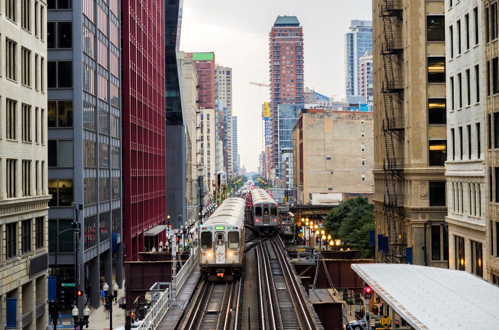 Image of busy Chicago subway system cruising through the downtown area.