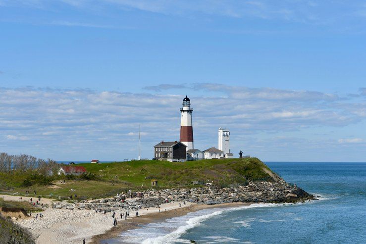 States and Counties With the Highest Rates of Lung Cancer - Infographics of Coastal lighthouse scene representing less urban counties, reminding of lung cancer's reach into both rural and seaside communities