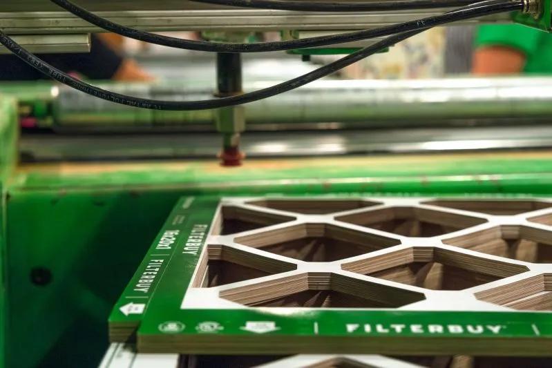 xploring the Different Types of Industrial Filters in Commercial Systems - Image of Filterbuy Air Filter packaging inside the manufacturing center.