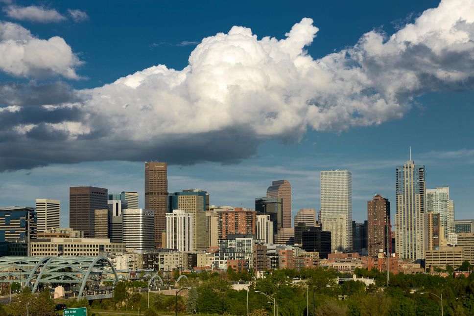 U.S. Cities with Worst and Best Air Quality - Infographics of clear view of Denver’s downtown, nestled beneath vast skies, reflecting the city’s air quality challenges due to its elevation and urban growth.