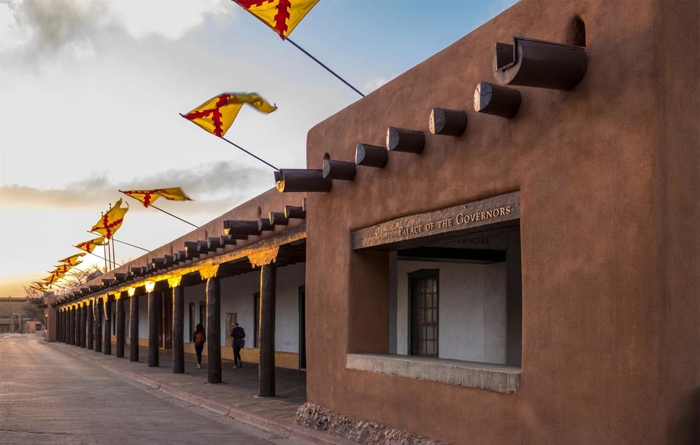 Palace of the Governors in Santa Fe, showing New Mexico as a state where residents face steep grocery prices.