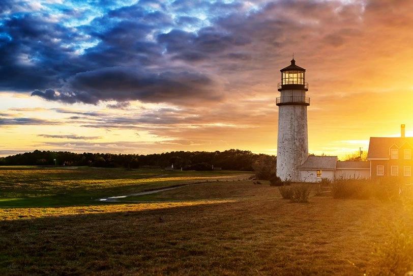 States and Counties With the Highest Rates of Lung Cancer - Infographics of a lighthouse in a coastal area like Massachusetts, reflecting the region’s focus on sustainable practices and low fossil fuel dependency.