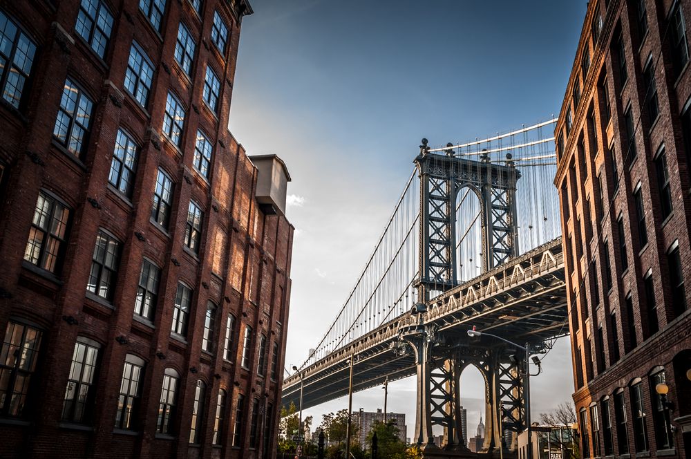 Image of New York-Newark-Jersey City, NY-NJ-PA metropolis with residential condominiums just beside the bridge.