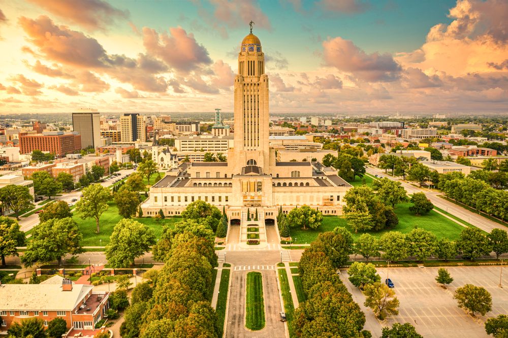 States With the Most Korean War Vets - Infographics of a Nebraska State Capitol building, symbolizing key locations where Korean War veterans may live.