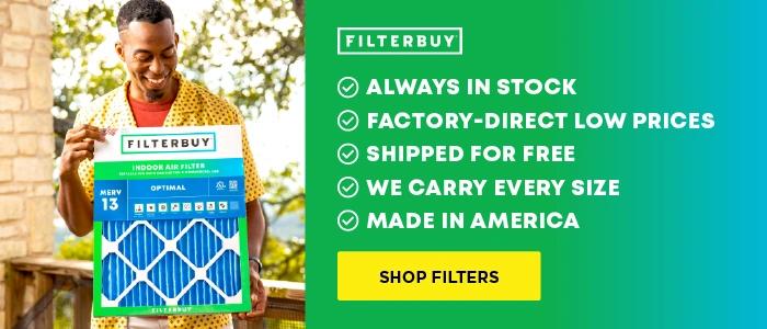 Image of a man holding MERV 13 Indoor air filter