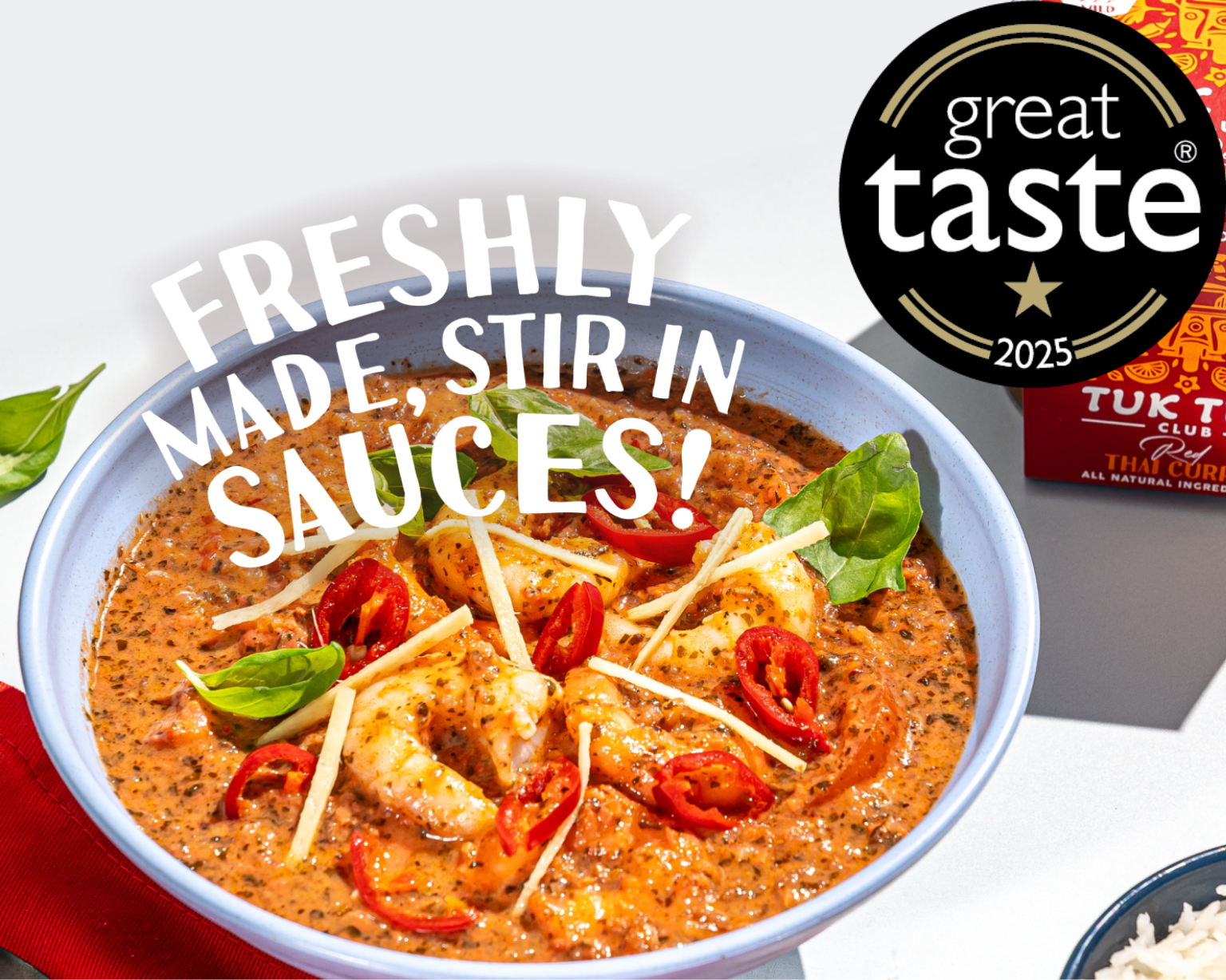 A Tuk Tuk Club meal with 'Freshly Made, stir in sauces!' written on top