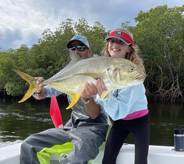 Captain David White Fishing Charters client with their catch