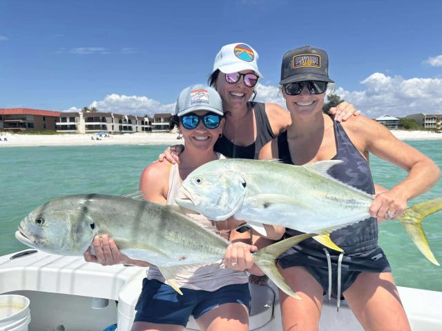 Captain David White Fishing Charters client with their catch