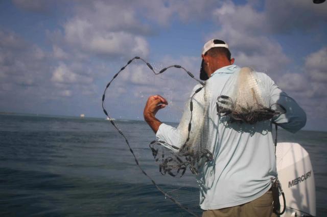 Captain David White Fishing Charters client with their catch