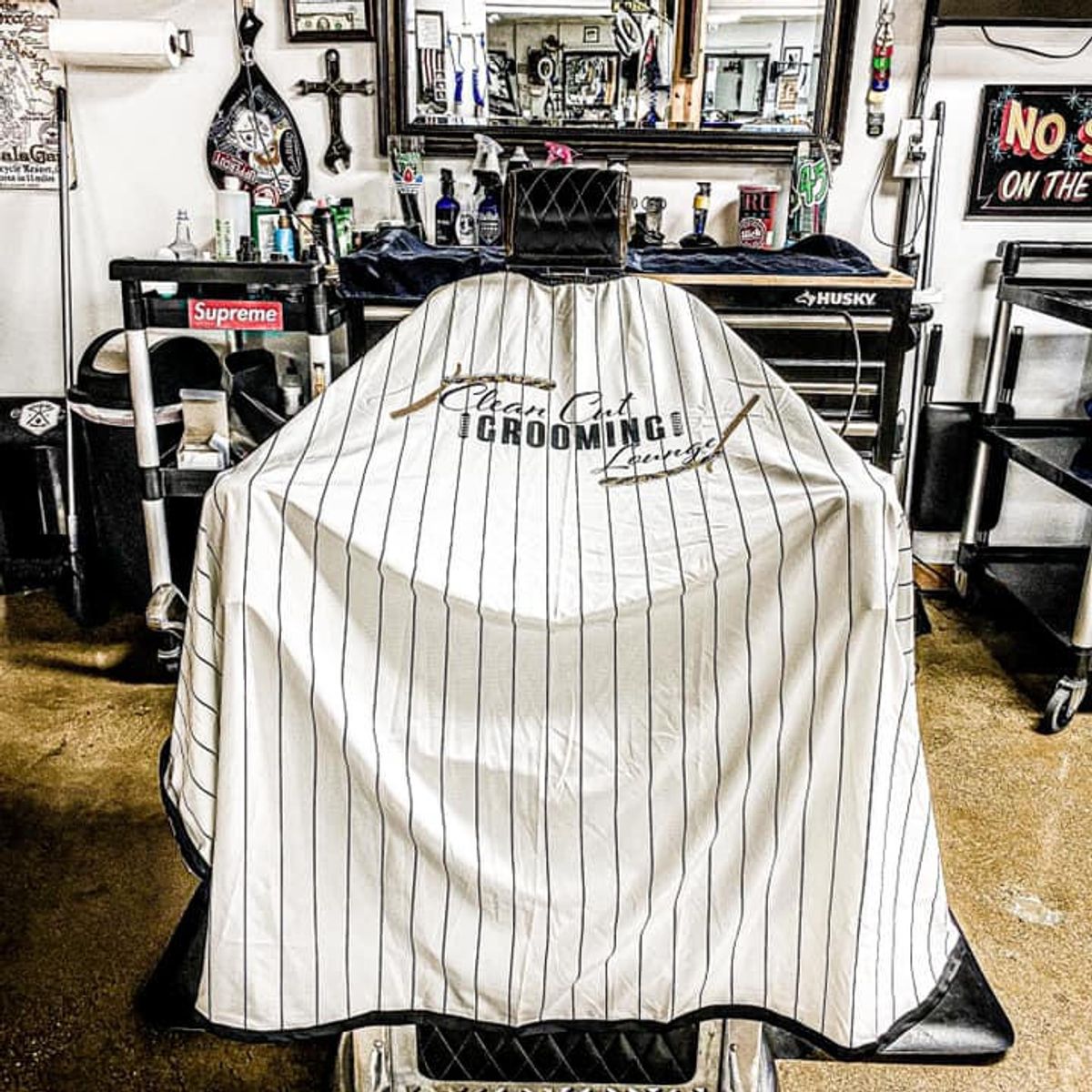 An empty barber chair at Clean Cut Grooming Lounge in Knoxville, TN.‍