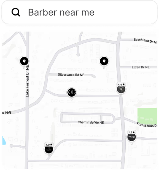 Map view with a search bar reading 'Barber near me,' showing several location pins for nearby barbershops; some pins display star ratings such as 4.9, 4.4, and 4.1.