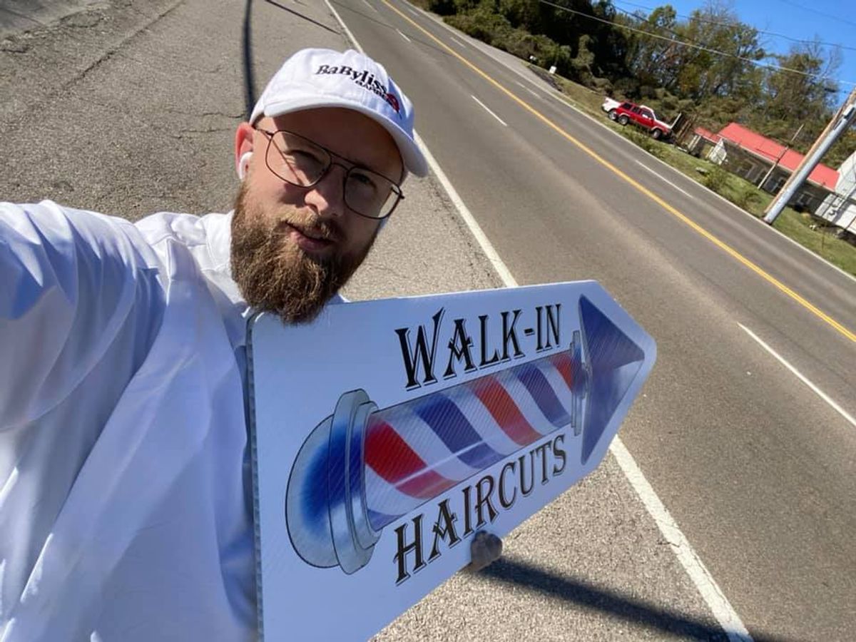 Tylor Trotter, owner of Clean Cut Grooming Lounge, out promoting his business in the streets of Knoxville, TN.