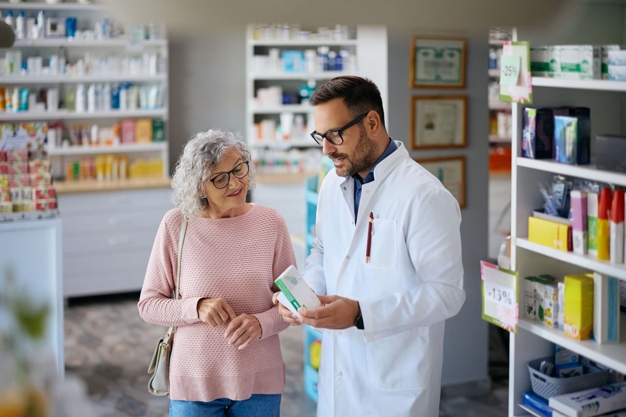 A pharmacist helping a patient in the pharmacy