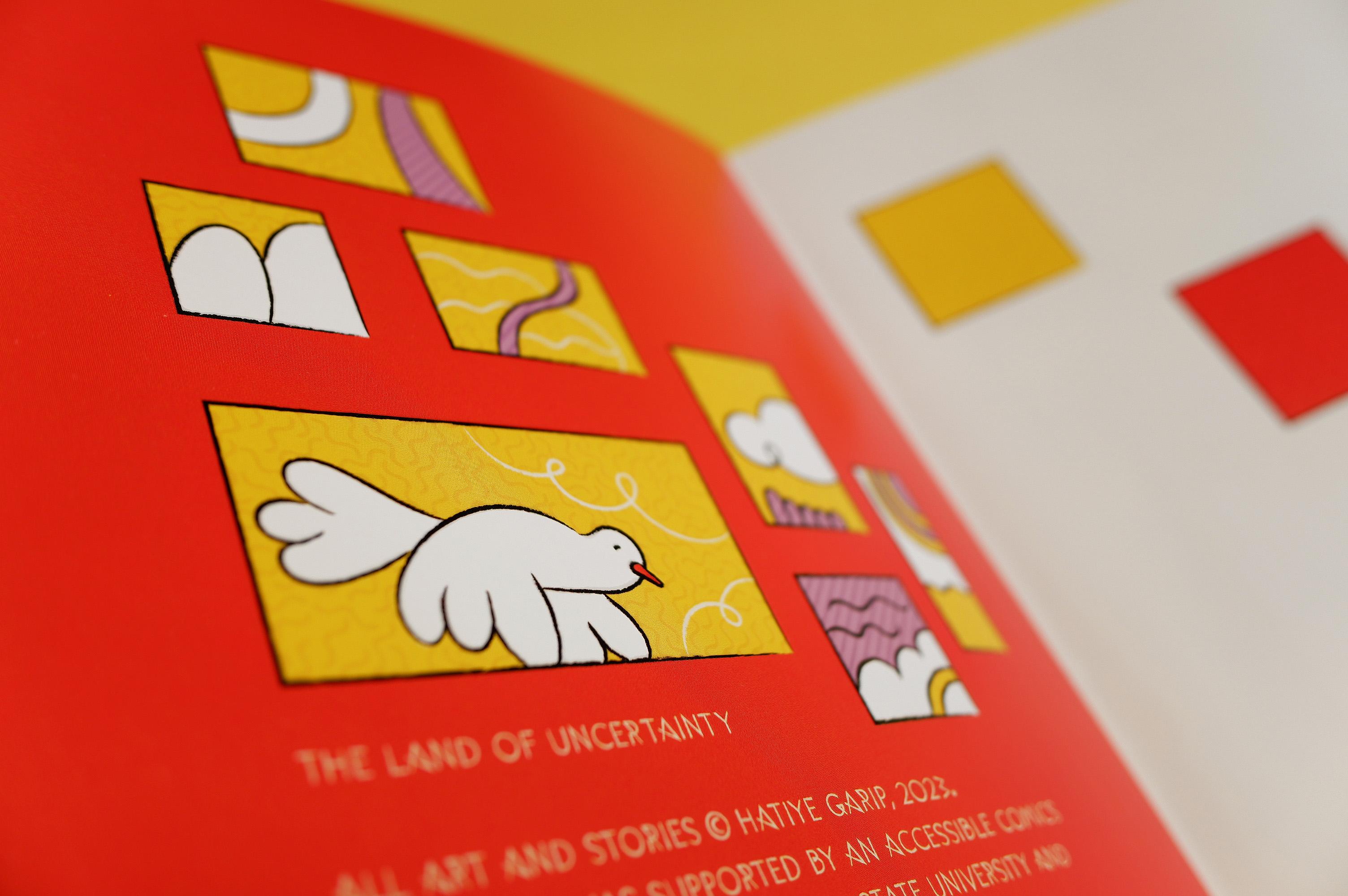 The page of an open book with colourful panels of illustration and some text.