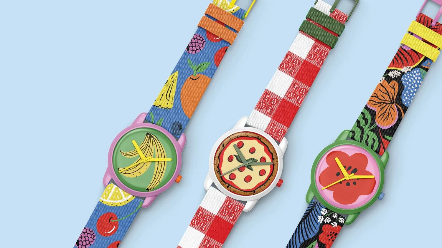 Three watches are lined up each with a different colourful pattern.