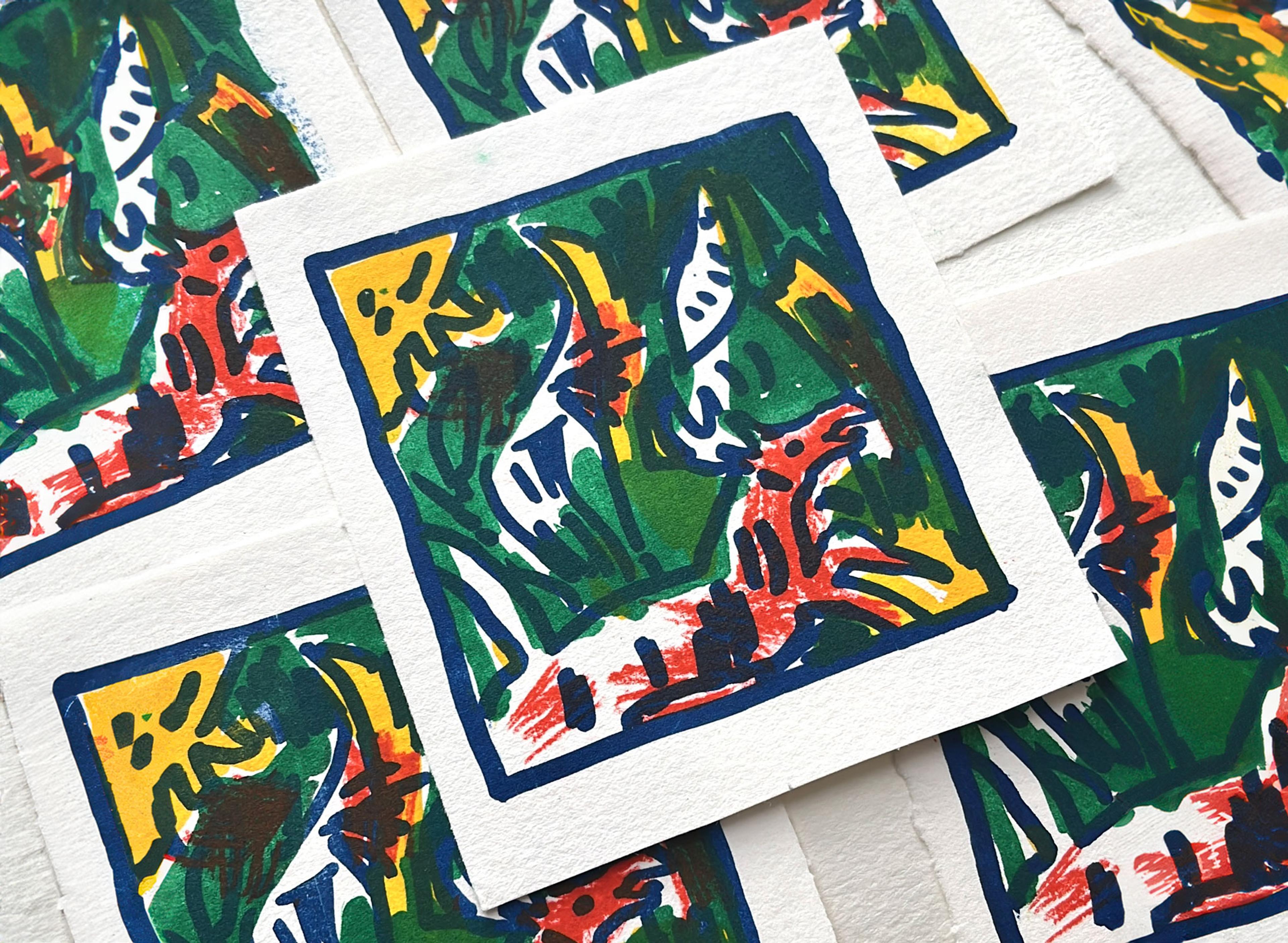 Pile of colourful illustrations of a animal in a forest.