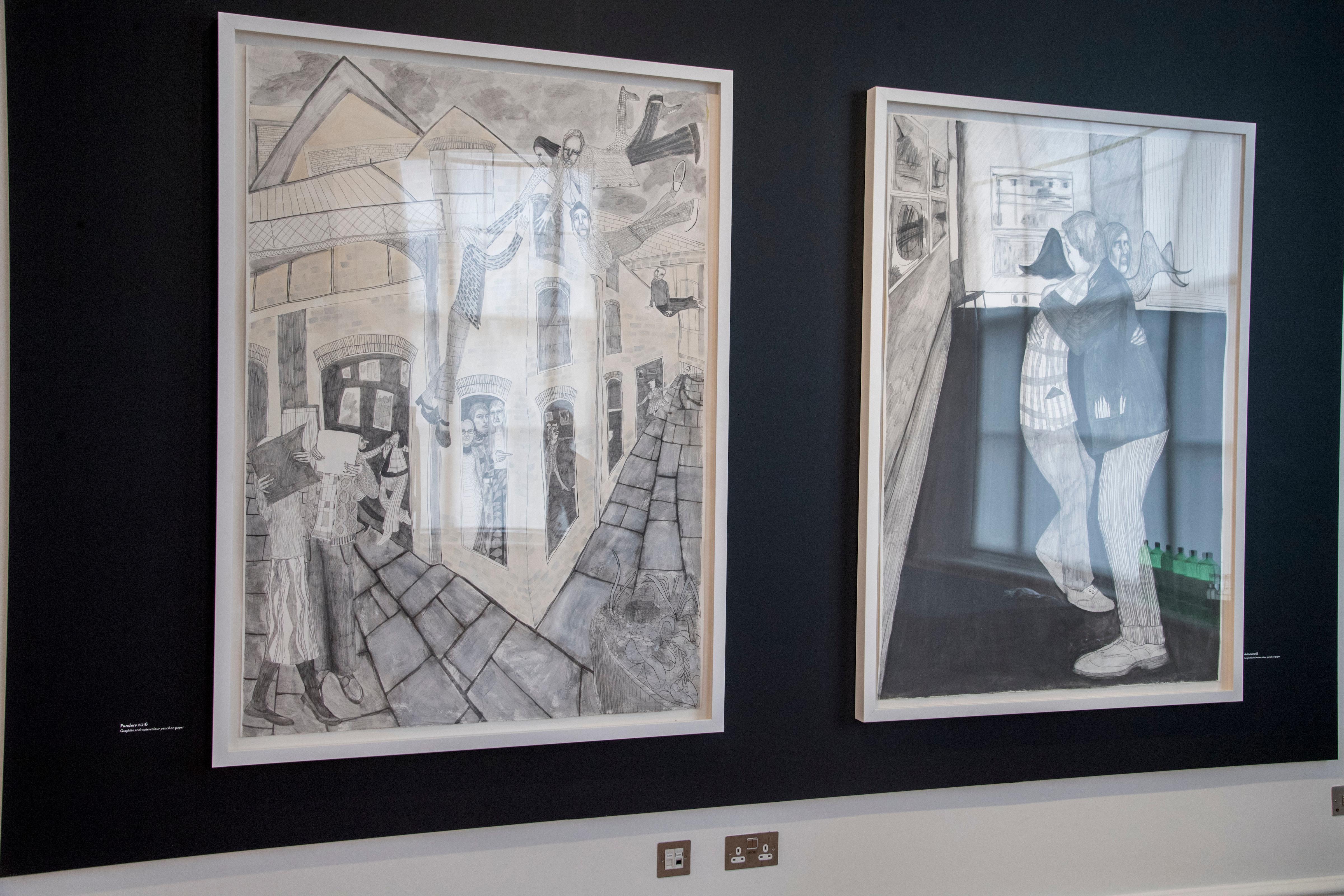 Photograph of framed artwork at the exhibition