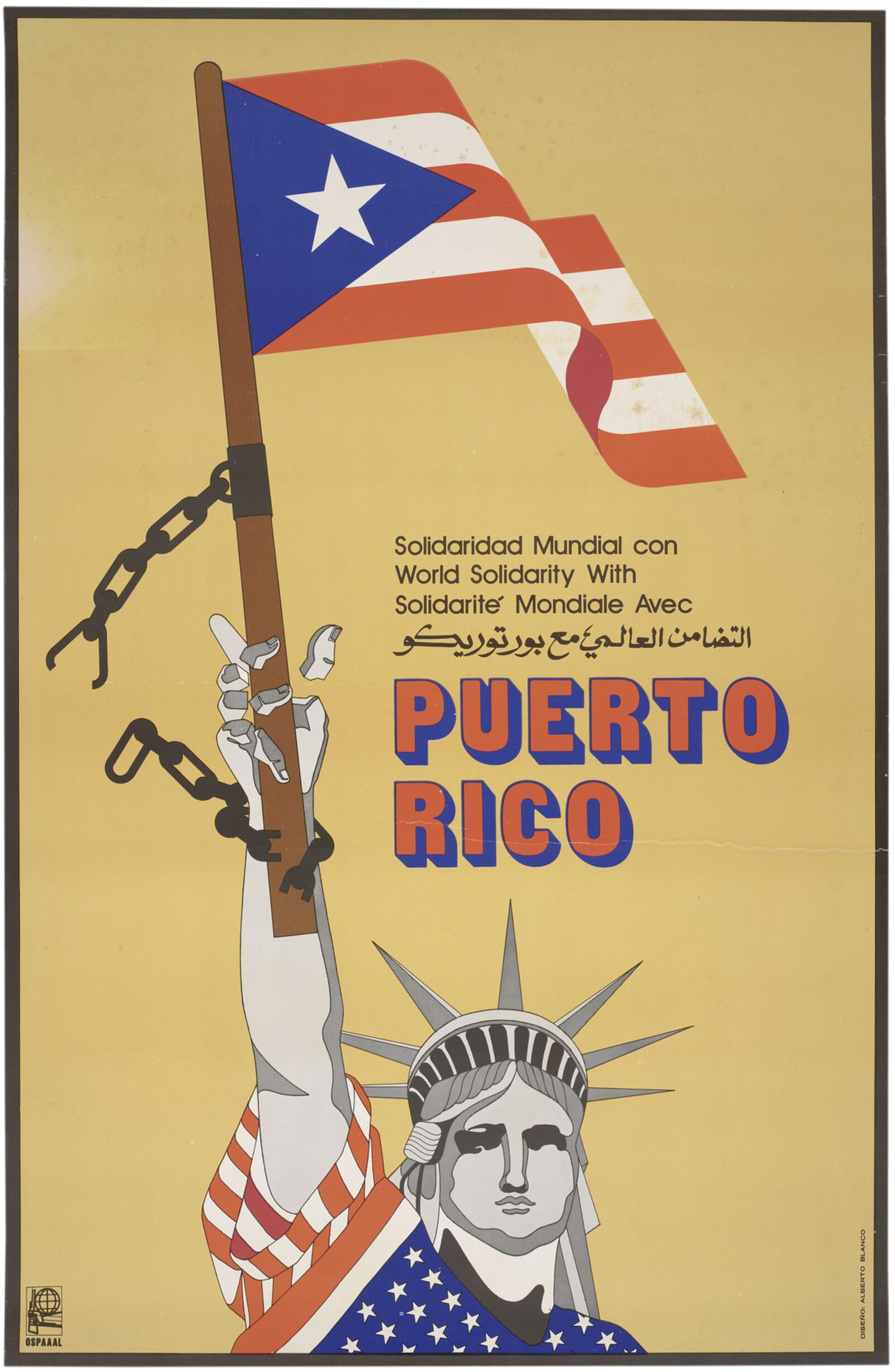 The Statue of Liberty holding a Puerto Rican flag. Her arm is chained to the flag pole but the chains as well as the stone of her hand are broken. Lettered across the centre in black, 'World Solidarity with Puerto Rico' in Spanish, English, French and Arabic.