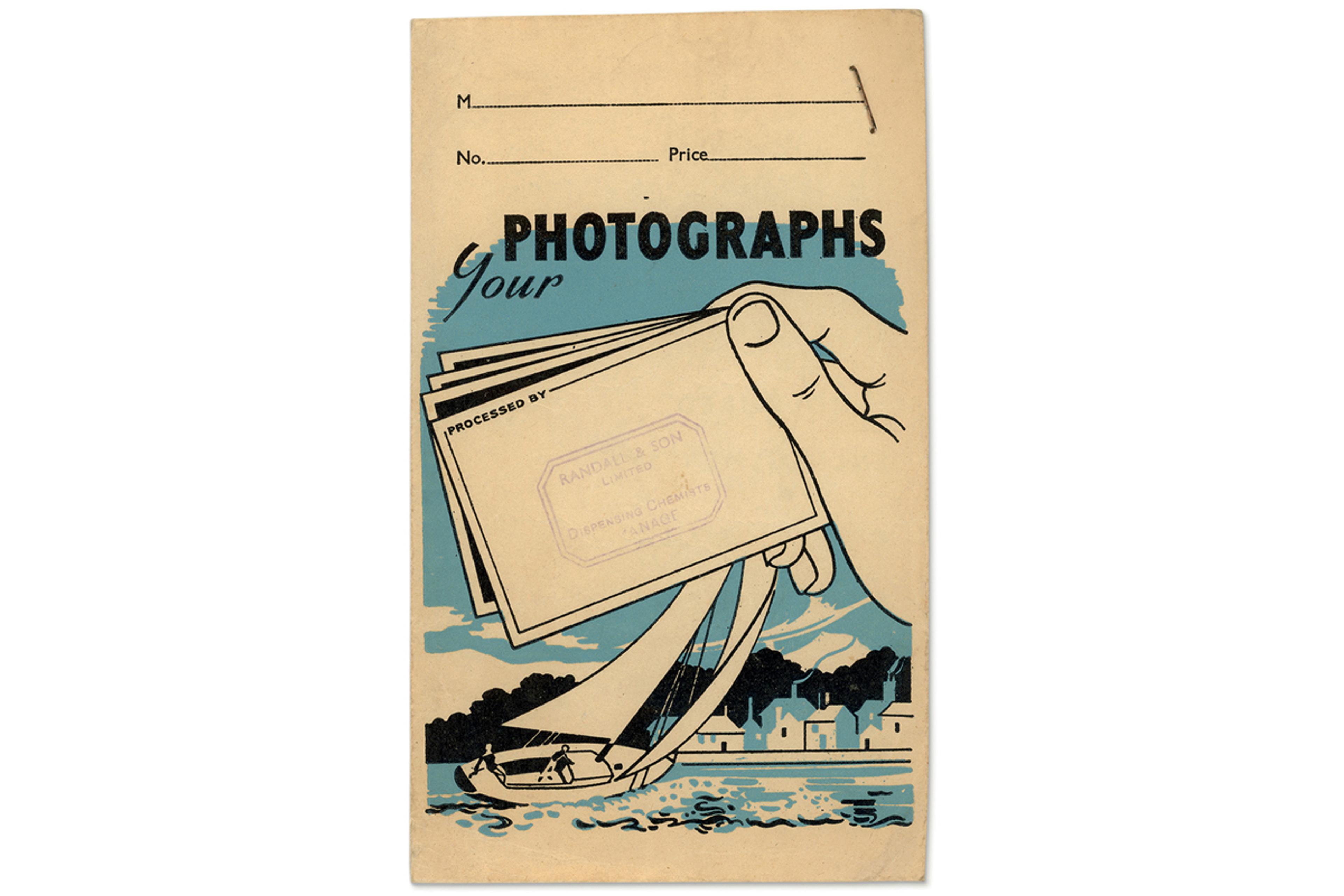 Image of an envelope with three lines named 'M', 'No.' and 'Price' at the top, below this the text 'Your Photographs'. Underneath this sits an illustration of a seaside landscape in the background and a close up hand in the foreground holding a card with the text 'Processed by' and the address of 'Randall & Son Limited'.