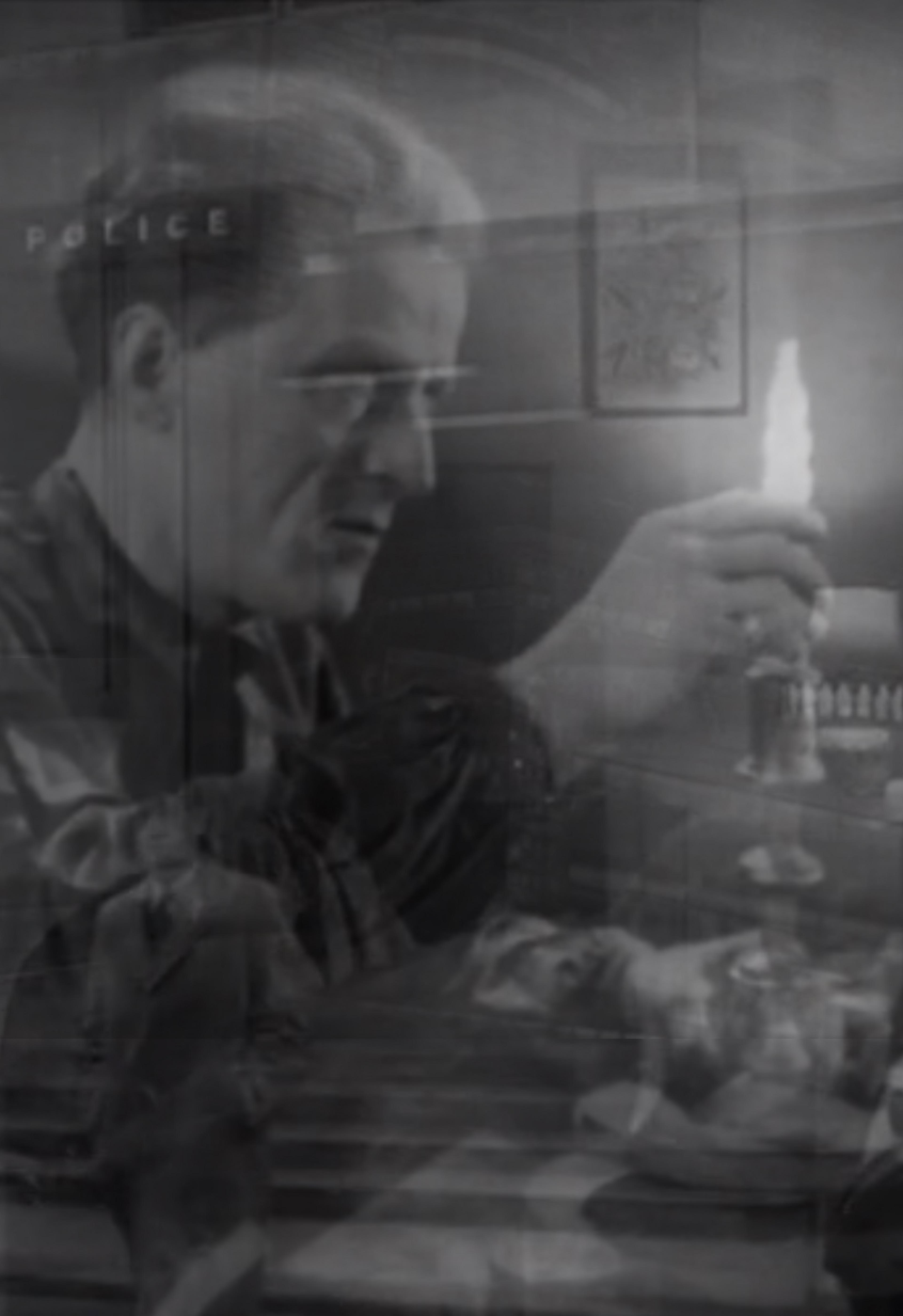 Photographic image of two overlayed scenes of someone screwing a bulb into a lampholder and an interior scene