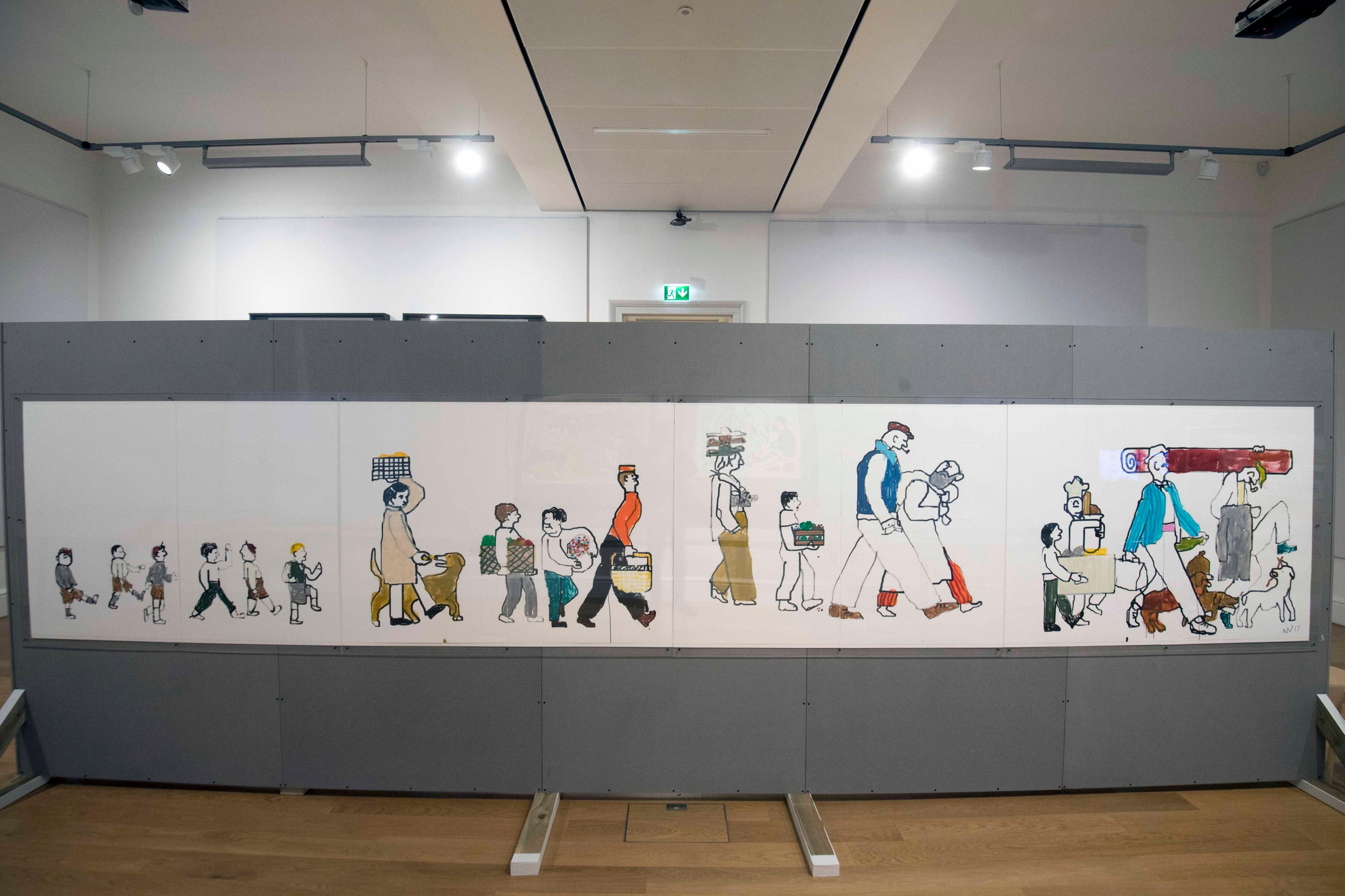 A large wall in an exhibition space with a large illustration of many people on it.