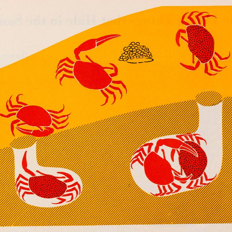 A wall of bright typography screen prints in white frames